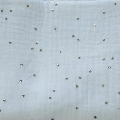 Blanc à pois dorés